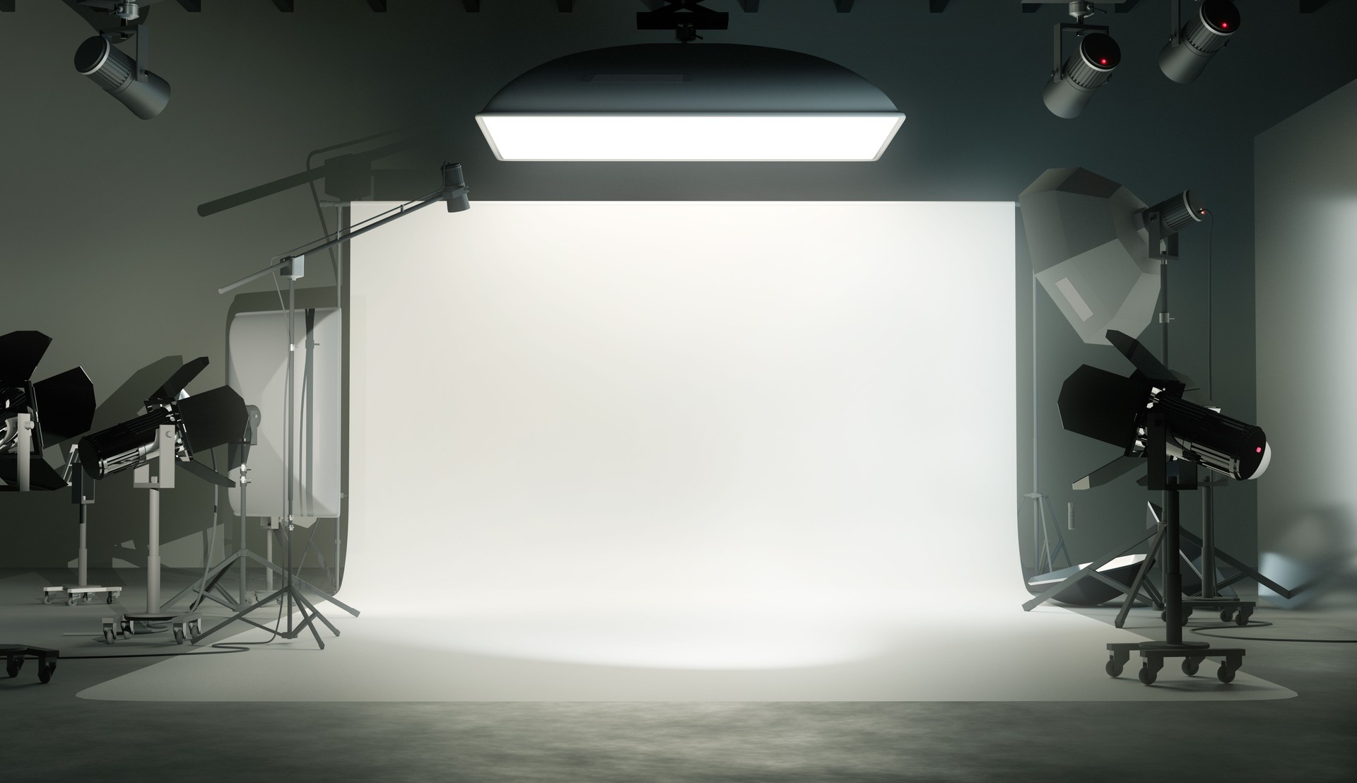 Photo Studio Room With White Backdrop And Lighting